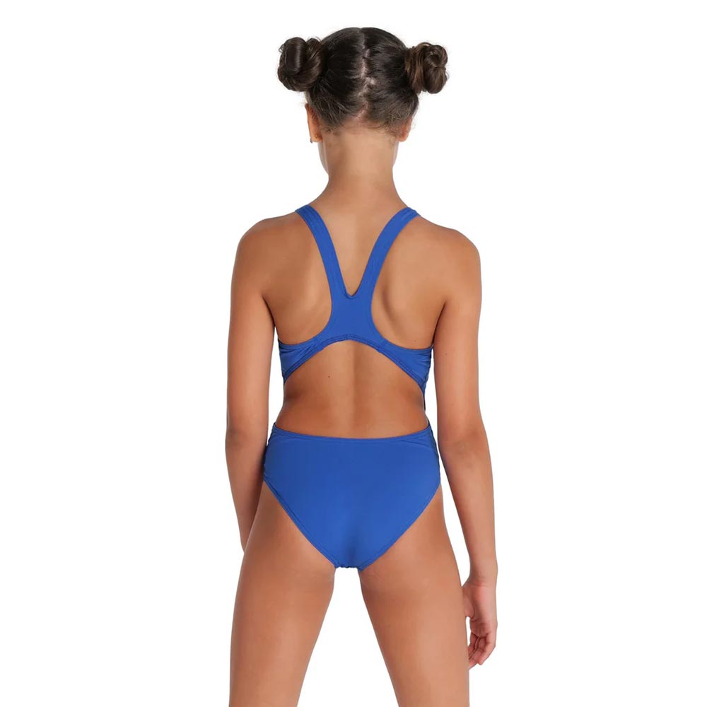 Back view of a girl wearing a royal blue arena girls team swimsuit.