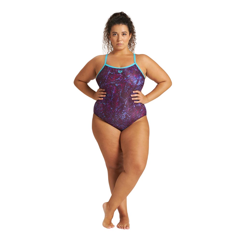 Woman wearing a purple pattern arena womens mountain plus swimsuit.