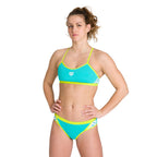 Woman wearing the arena womens team stripe bikini swimwear set.