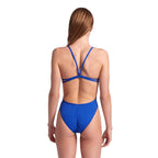 The back view of a woman wearing the Arena lace one piece swimsuit in the royal colour.
