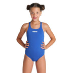Front view of a girl wearing a royal blue arena girls swimsuit with arena logo printed in white on the chest area.