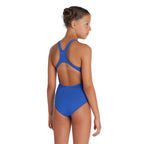 Back view of a young girl wearing a royal blue arena team swim pro swimsuit.