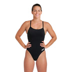 Woman wearing the arena womens team control swimsuit in black.