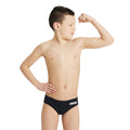 Boy wearing black arena boys team swim briefs.