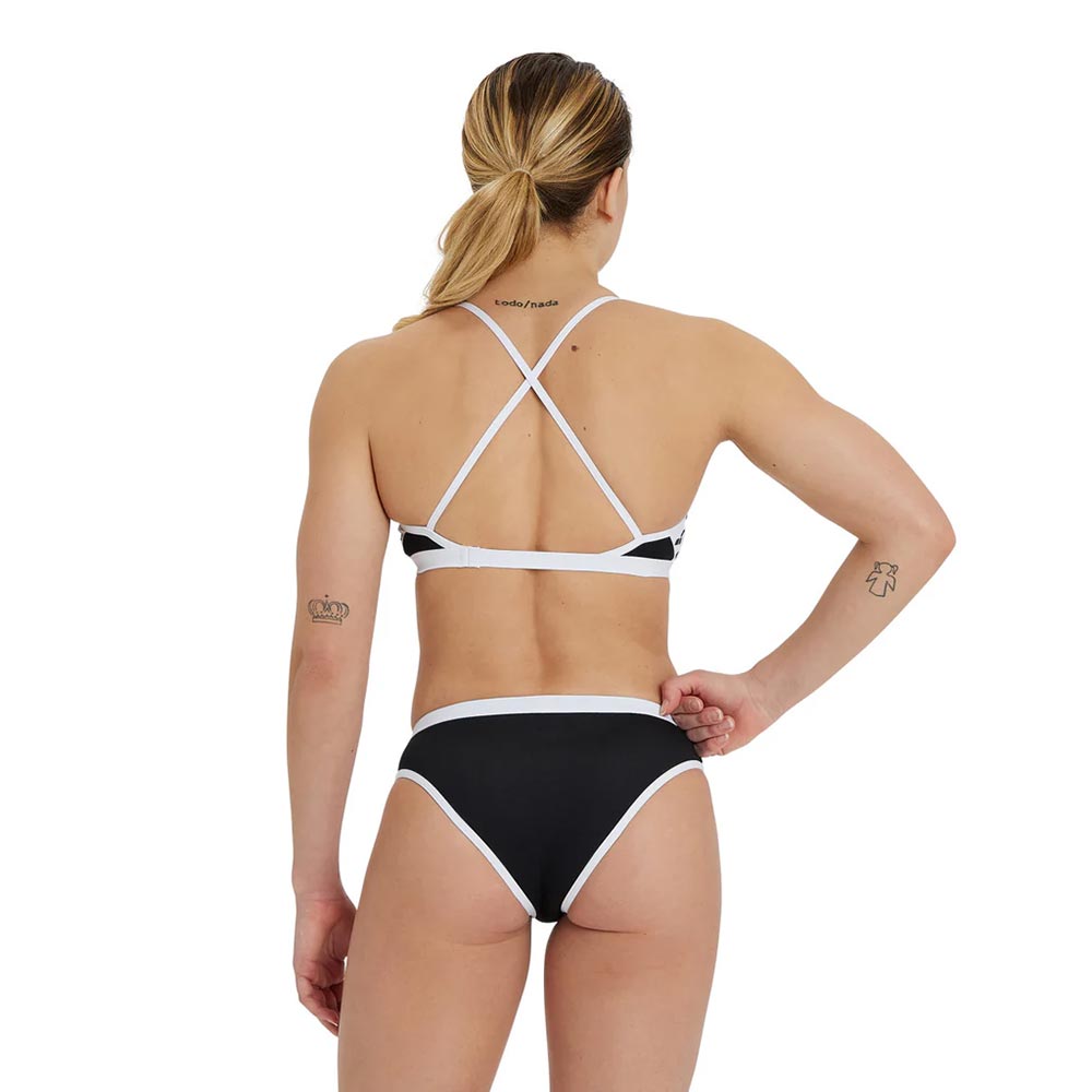 Back view of a woman wearing the arena womens icons bikini set in black and white.