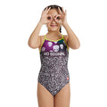 Girl wearing a swimsuit with 'No Signal' text and alien design.