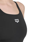 Close up of the arena womens boyleg one piece swimsuit in black with arena logo printed in white.