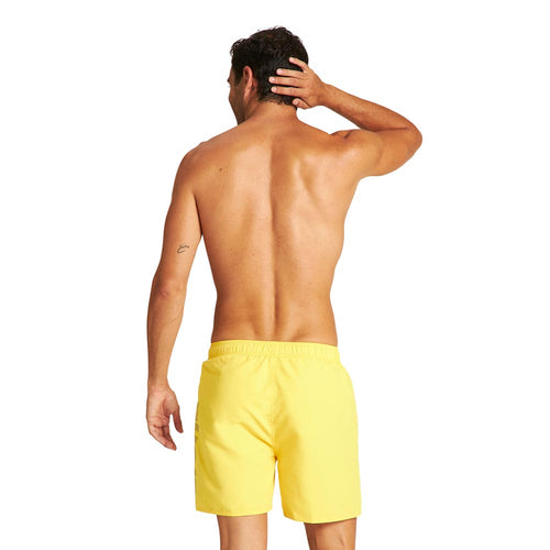 Arena Fundamentals Logo Swim Shorts: Men's yellow swim shorts with subtle logo detail.