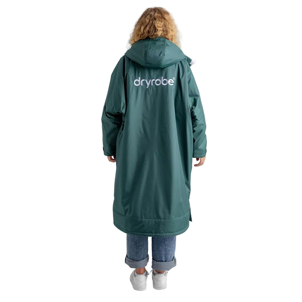 Dryrobe Advance Adults Change Robe in dark green, worn over jeans and trainers