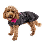 Dryrobe Dog Raincoat in black camo with pink trim, designed for warmth and protection