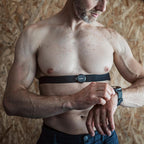 Suunto Smart Heart Rate Monitor Belt, 30M WR, worn by man checking his watch