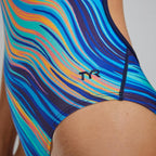 TYR Women's RipTidal Crosscutfit Tieback Swimsuit in a vibrant blue, teal, and orange wavy stripe pattern